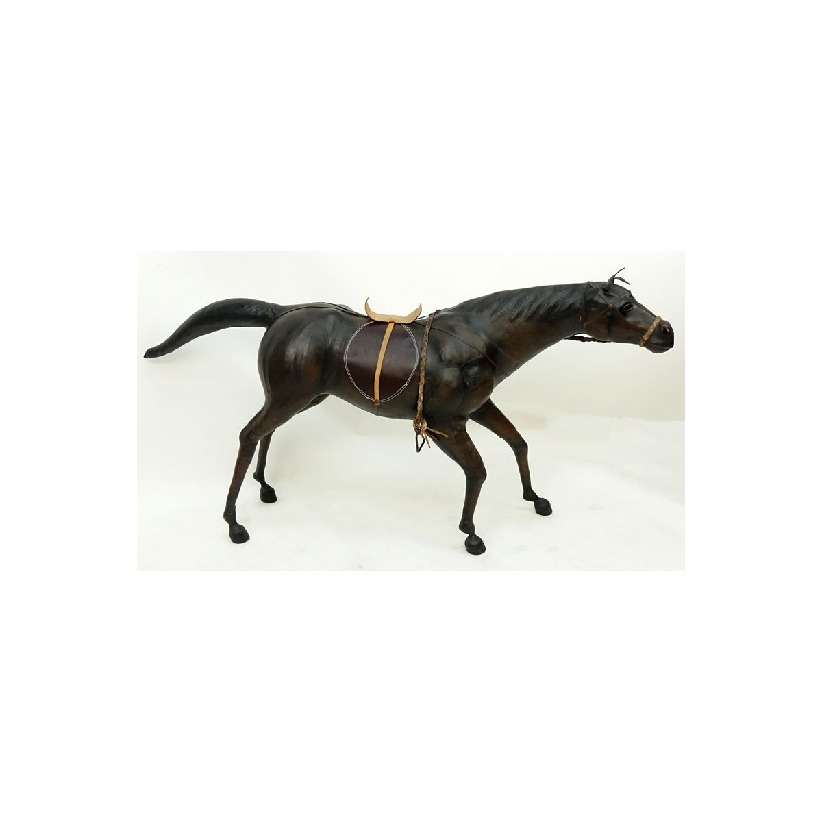 Large Vintage Leather Wrapped Model of a Horse. Normal rubbing to surface, junction to tail or else