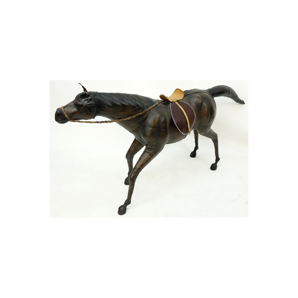 Large Vintage Leather Wrapped Model of a Horse. Normal rubbing to surface, junction to tail or else