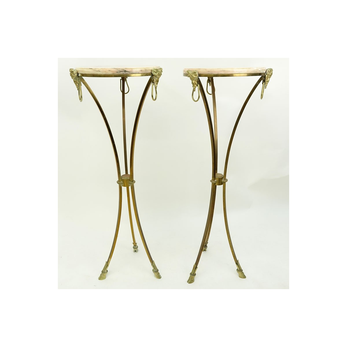 Pair of Marble Top Maison Jansen Style Brass Pedestal Tables. Rams head fittings standing on hoof f