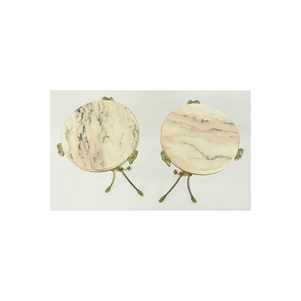 Pair of Marble Top Maison Jansen Style Brass Pedestal Tables. Rams head fittings standing on hoof f