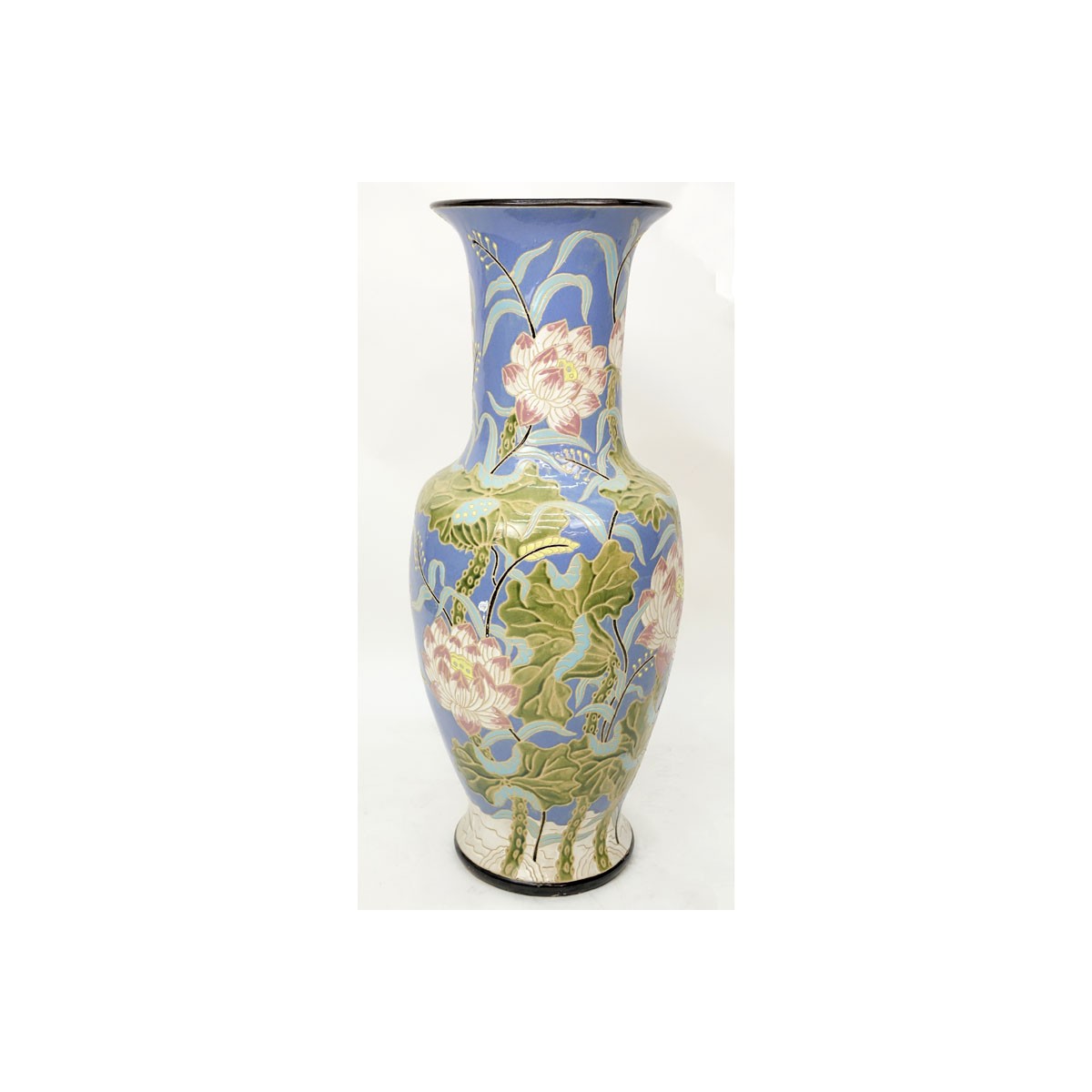 Monumental Majolica Pottery Vase. Features Asian inspired lotus flower motif on blue ground. Unsign