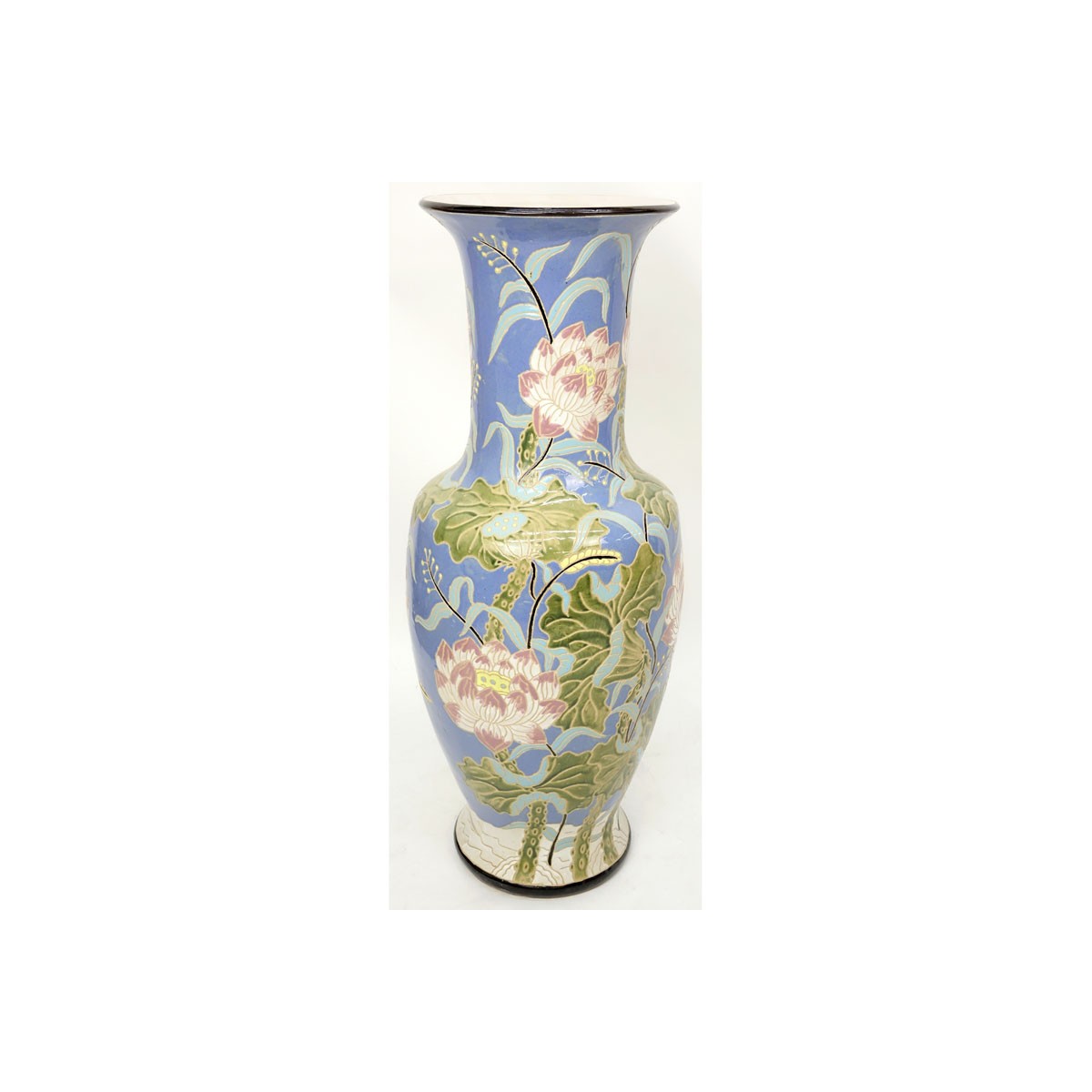 Monumental Majolica Pottery Vase. Features Asian inspired lotus flower motif on blue ground. Unsign