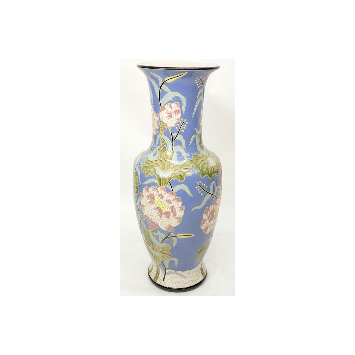 Monumental Majolica Pottery Vase. Features Asian inspired lotus flower motif on blue ground. Unsign