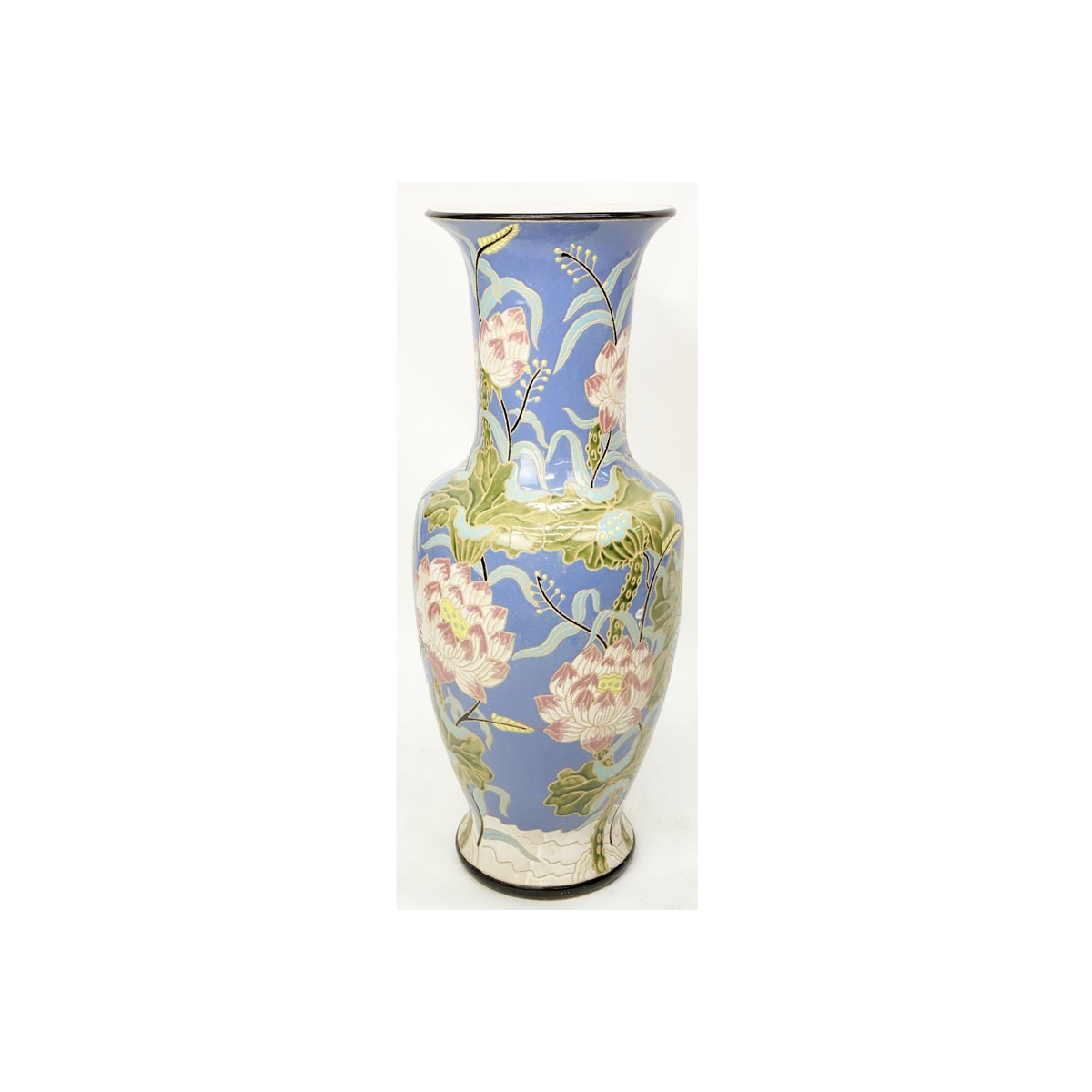 Monumental Majolica Pottery Vase. Features Asian inspired lotus flower motif on blue ground. Unsign