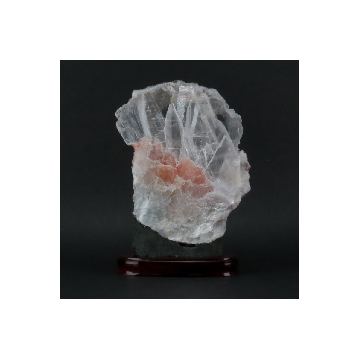 Rock Quartz Lapidary Specimen on Wooden Stand. Clear to rose color shades and various structures. N