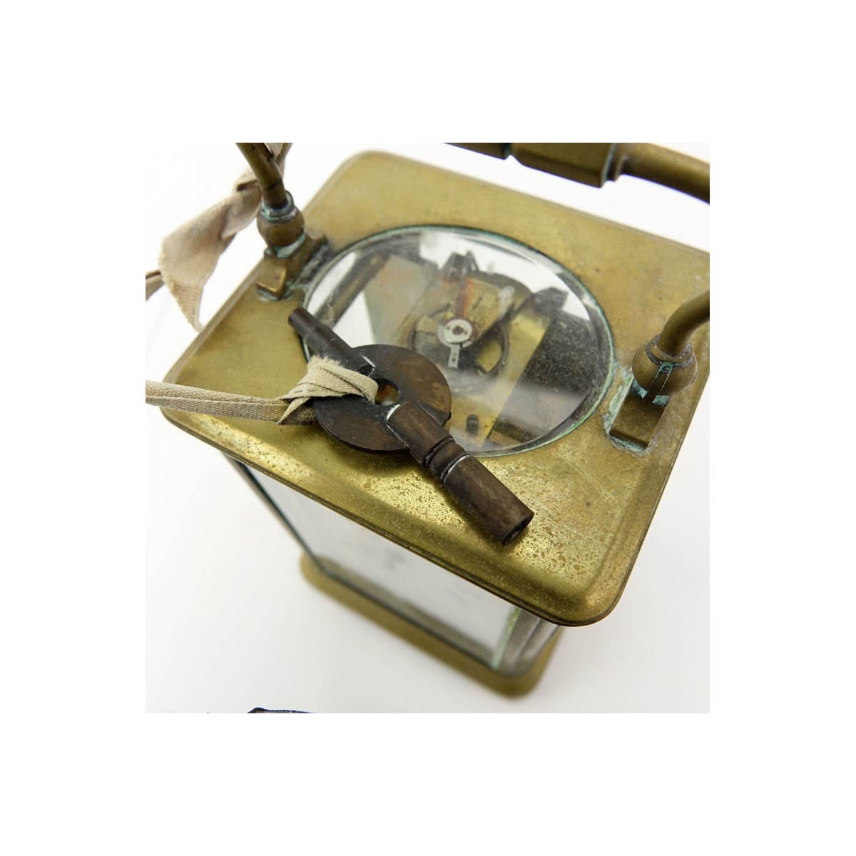 Antique Carriage Clock With Open Escapement. Key included. Unmarked. Obvious wear with rust, not ru