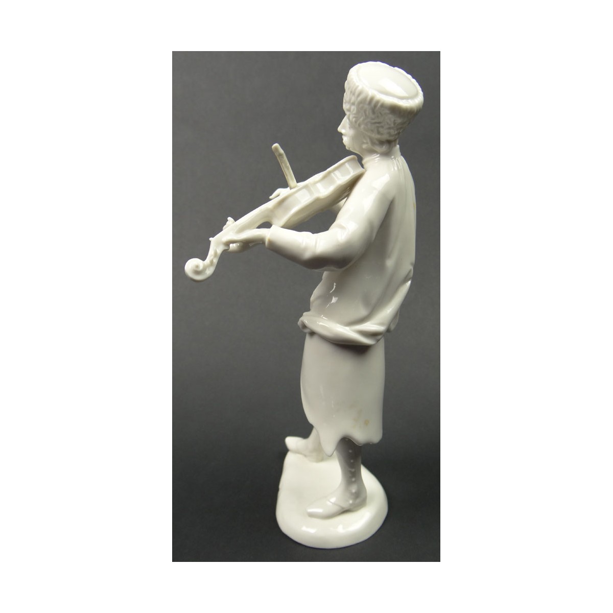 Nymphenburg Porcelain Figure of a "Violinist". Signed on Base Nymphenburg with Green Underglaze Mar