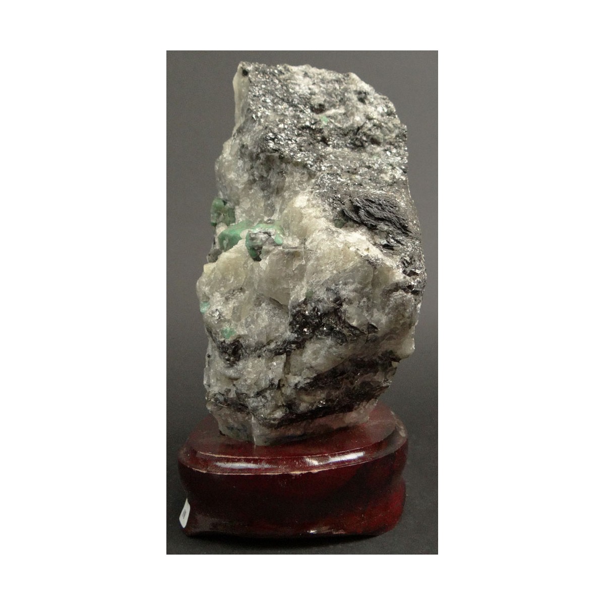 Mineral Specimen with Emeralds Mounted on Wooden Base. Measures 6-7/8 Inches by 6-1/2 Inches. Measu