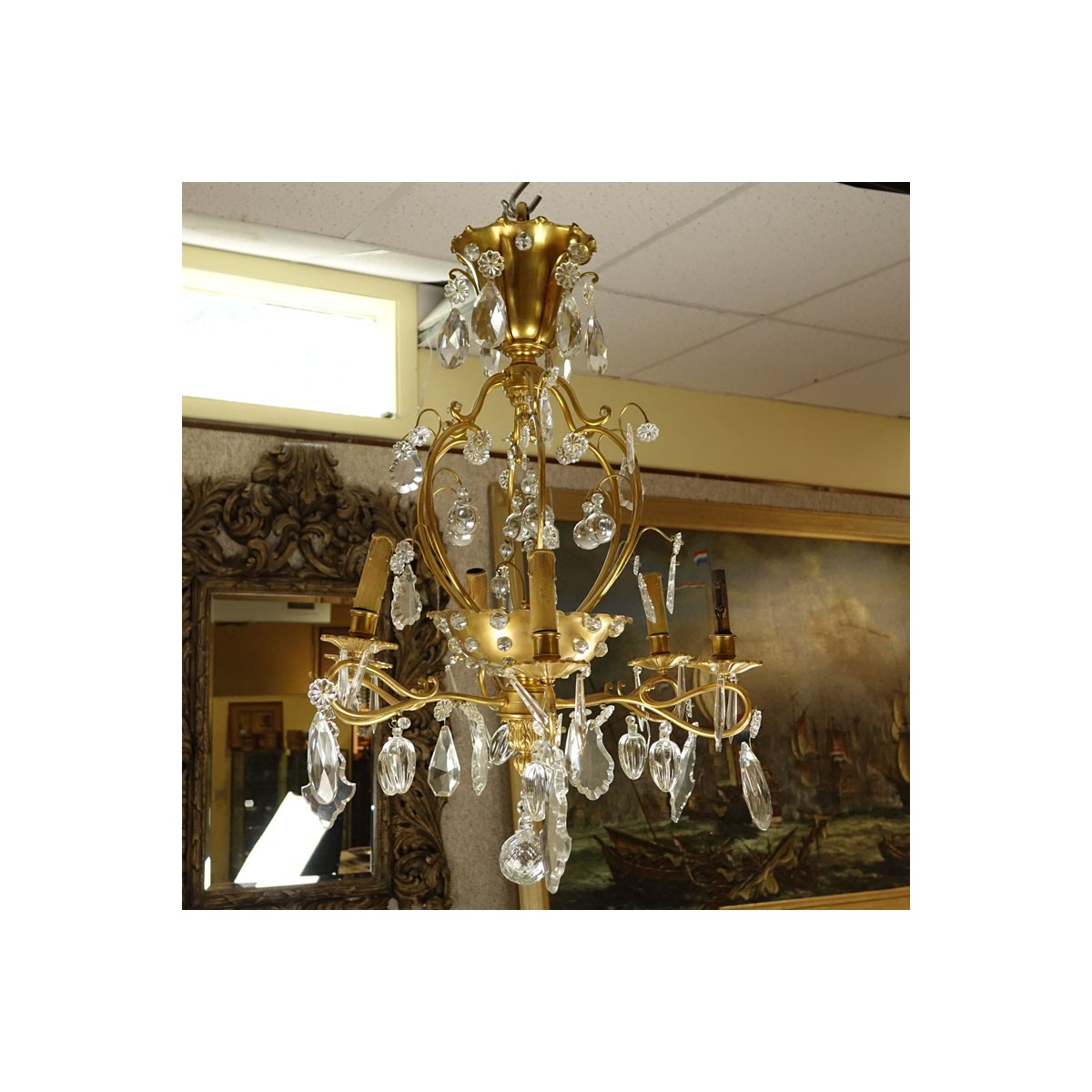 Late 19th/Early 20th Century Rococo Style Gilt Bronze and Crystal 6-Arm Chandelier. Decorated with