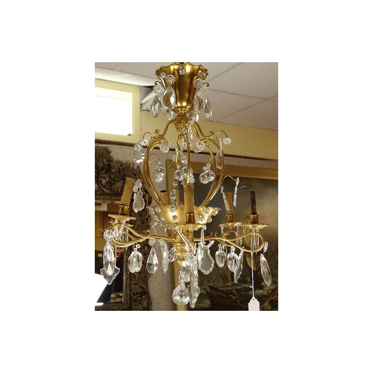 Late 19th/Early 20th Century Rococo Style Gilt Bronze and Crystal 6-Arm Chandelier. Decorated with