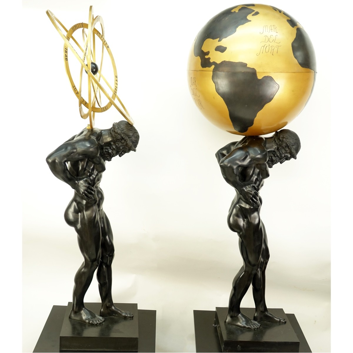 Pair of Atlas Bronze Sculptures