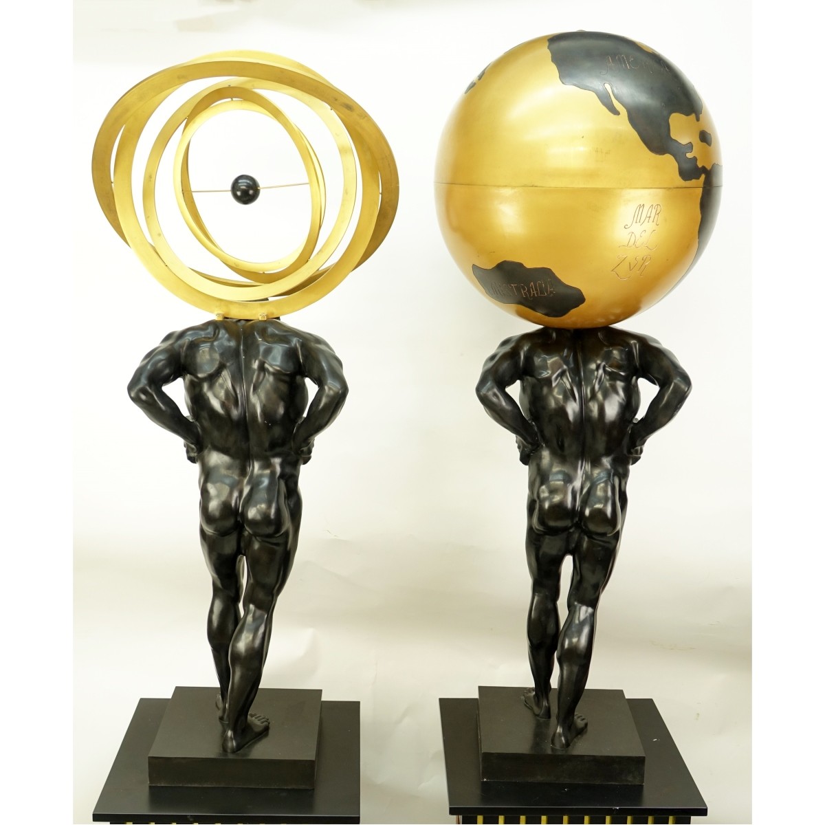 Pair of Atlas Bronze Sculptures