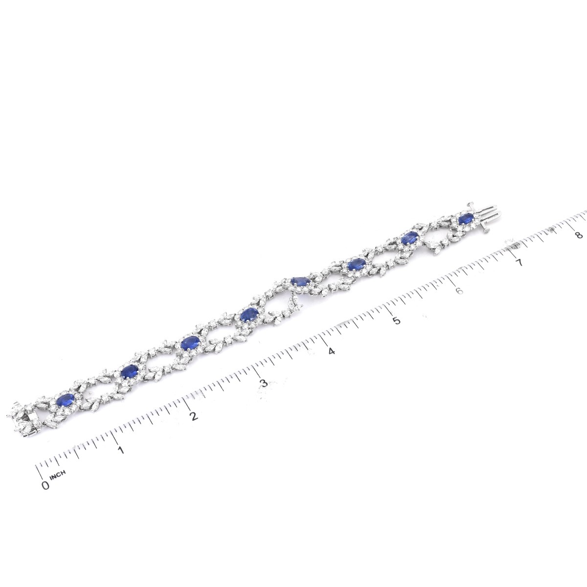 Diamond, Sapphire and 18K Gold Bracelet.