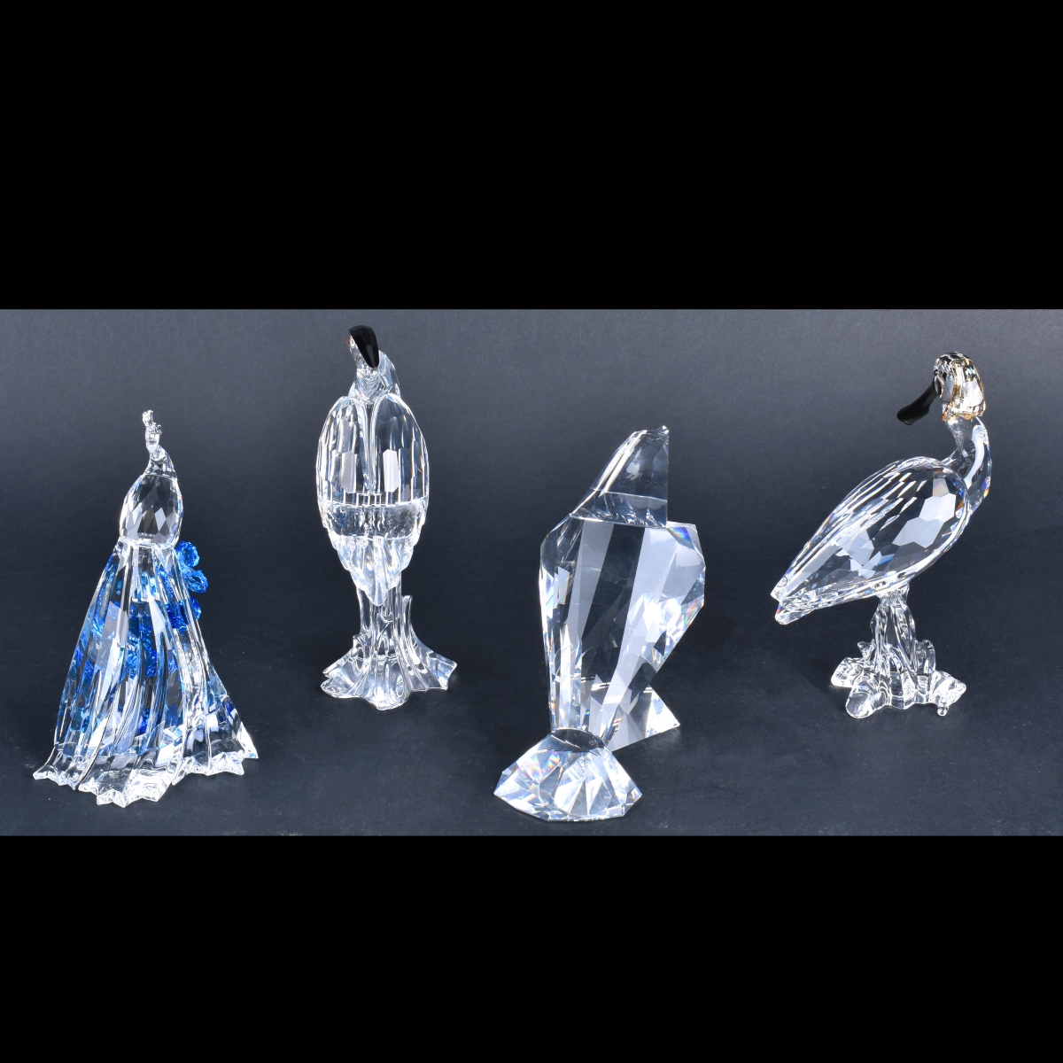 Four Swarovski Figurines