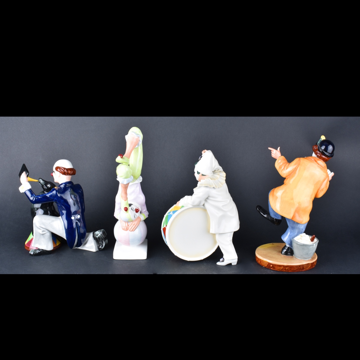 Four Porcelain Figurines