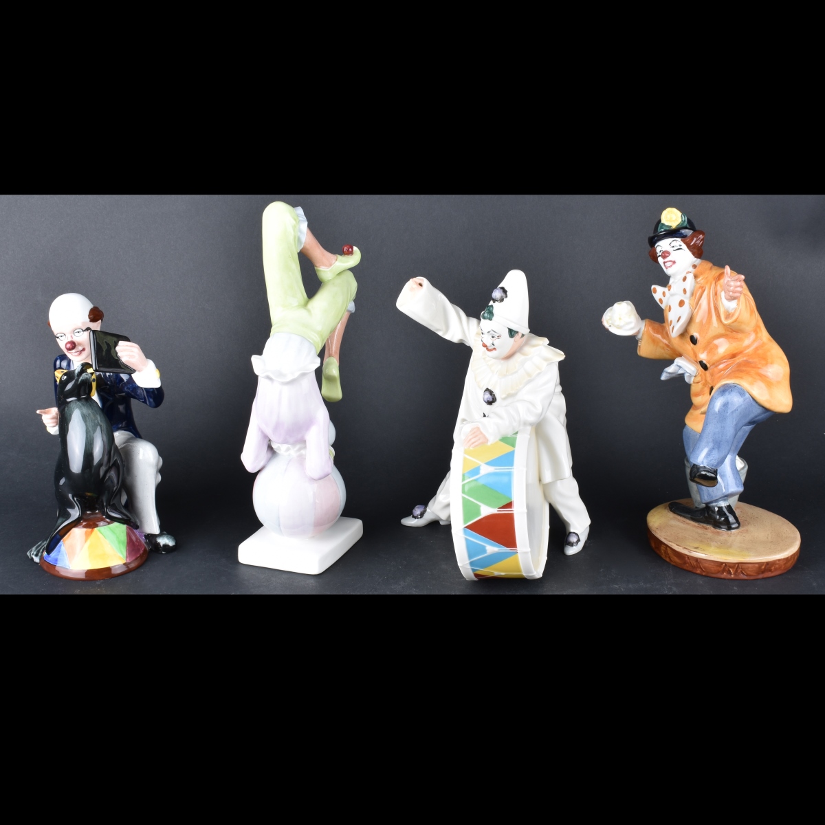 Four Porcelain Figurines