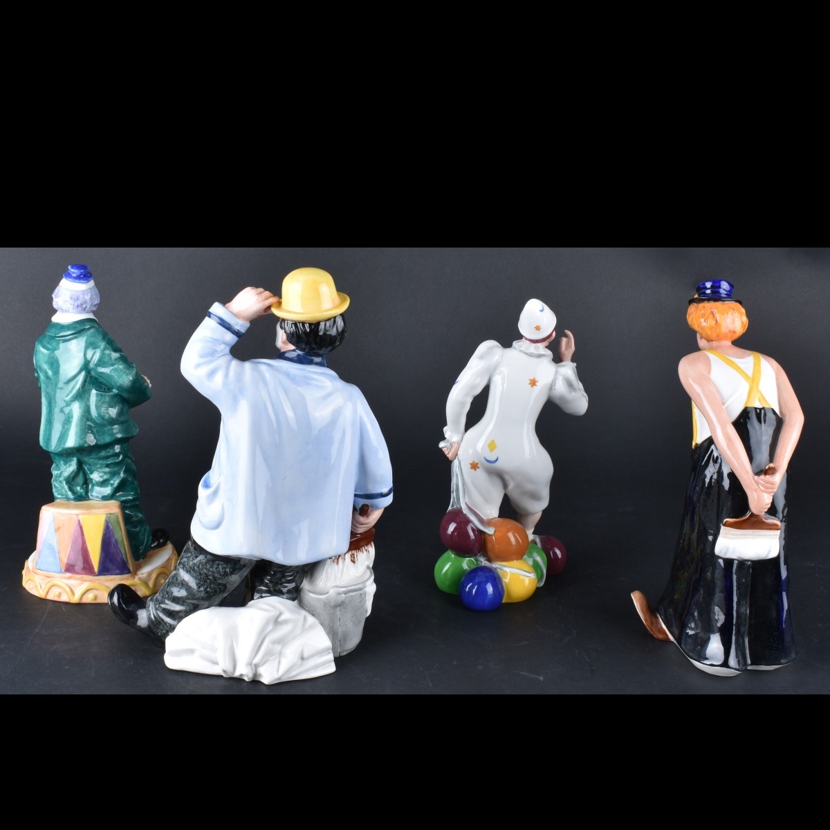 Four Royal Doulton Figurines