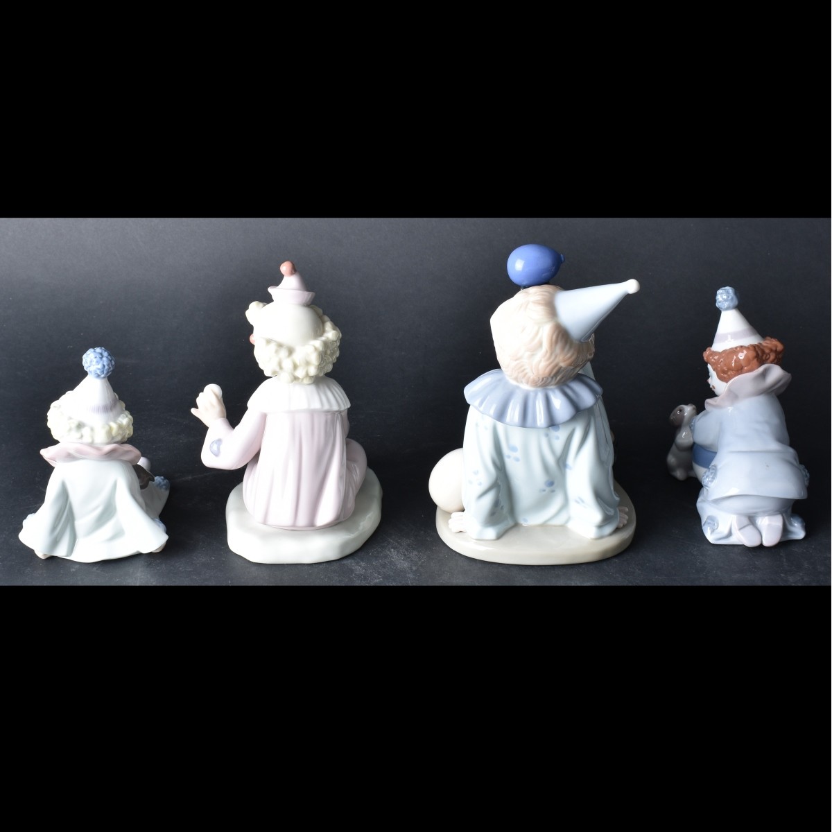 Four Porcelain Figurines