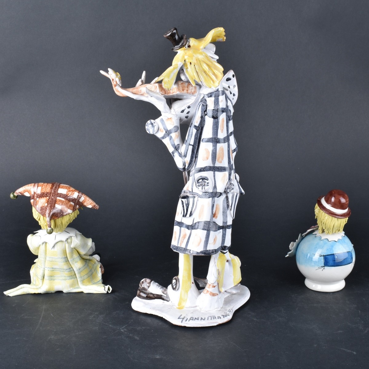 Three Clown Figurines