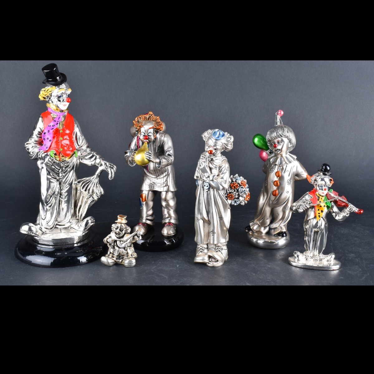 Seven Silver/Laminated Silver Figurines