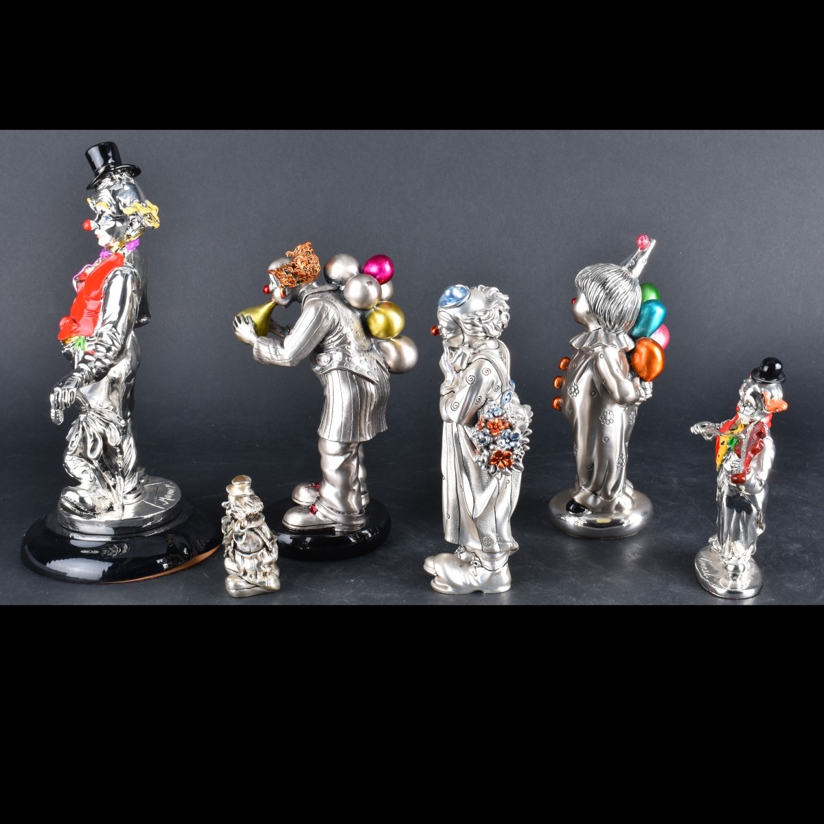 Seven Silver/Laminated Silver Figurines