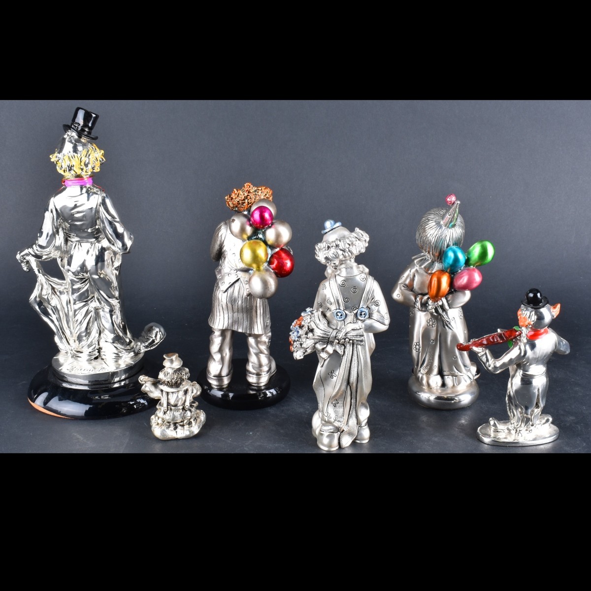 Seven Silver/Laminated Silver Figurines
