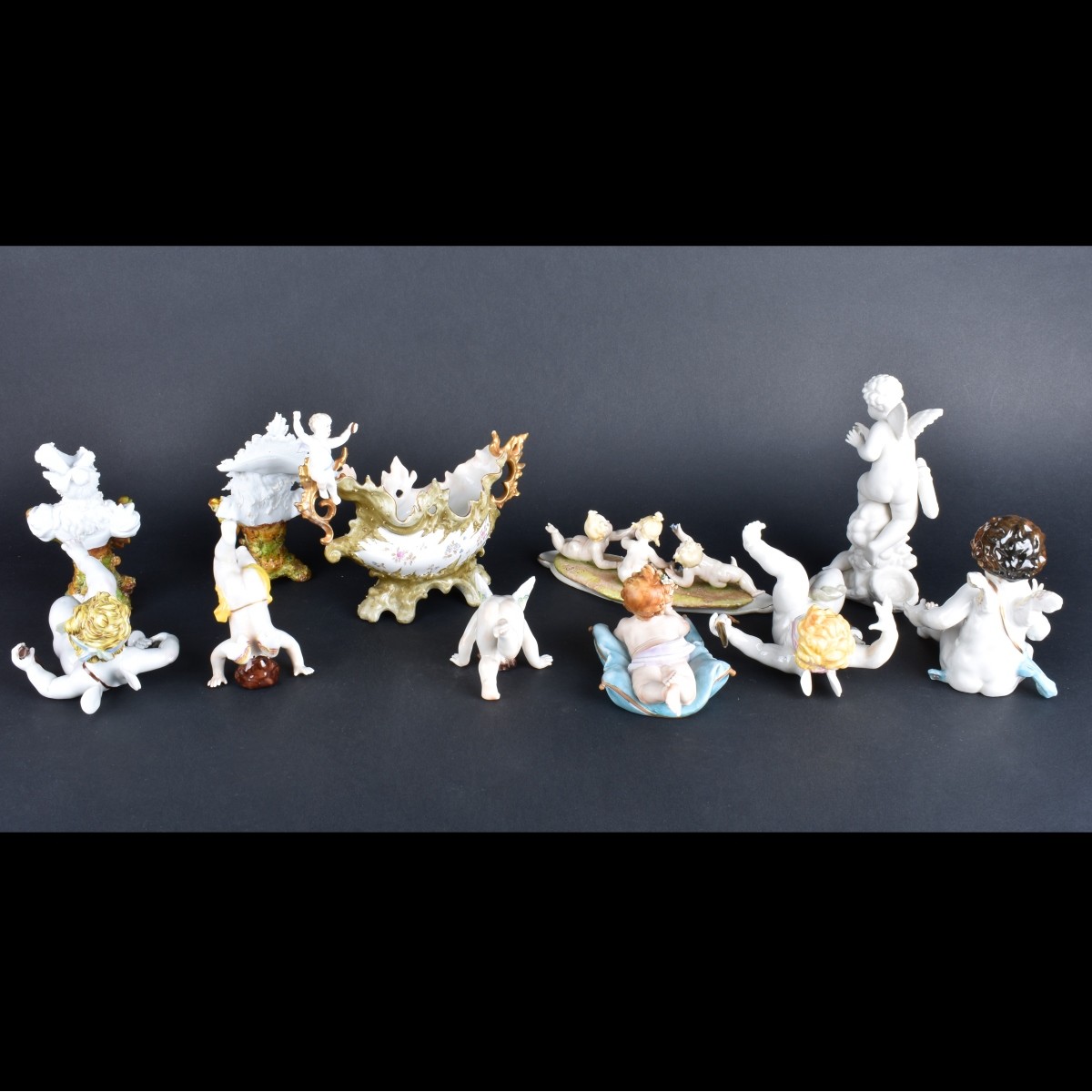 Eleven Porcelain/Bisque Figurines