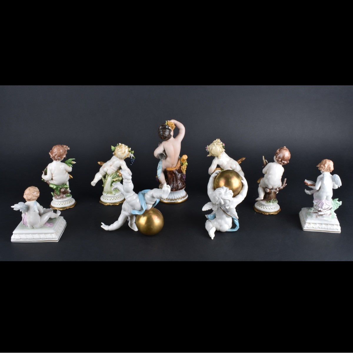 Nine Porcelain/Bisque Figurines