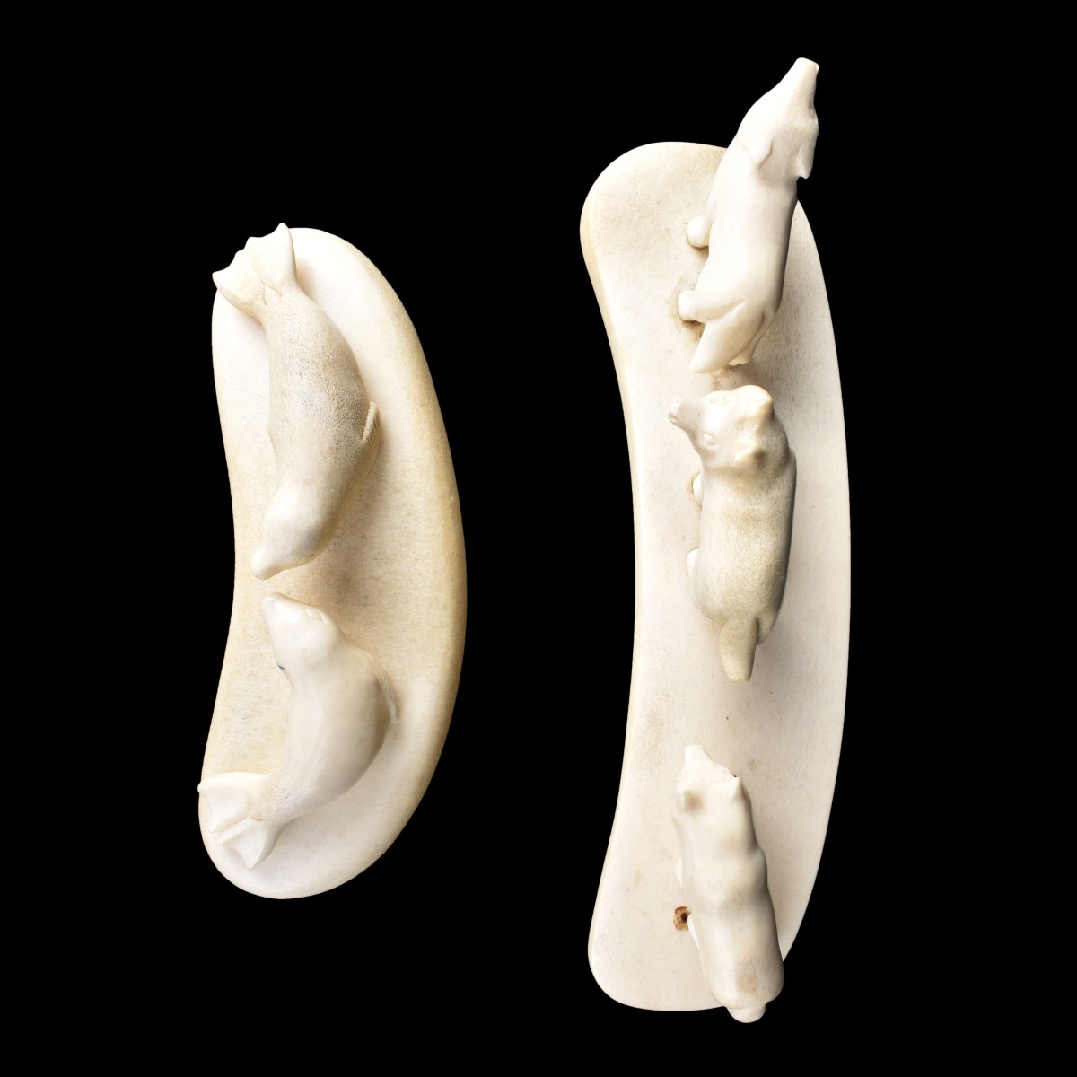 Two Inuit Walrus Ivory Carvings