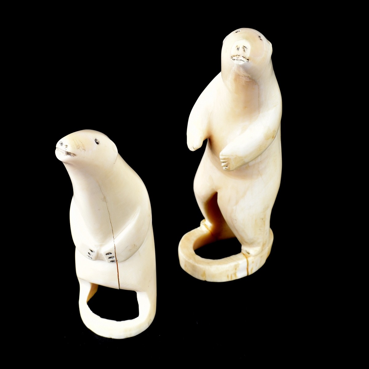 Four Inuit Carved Walrus Ivory Figurines