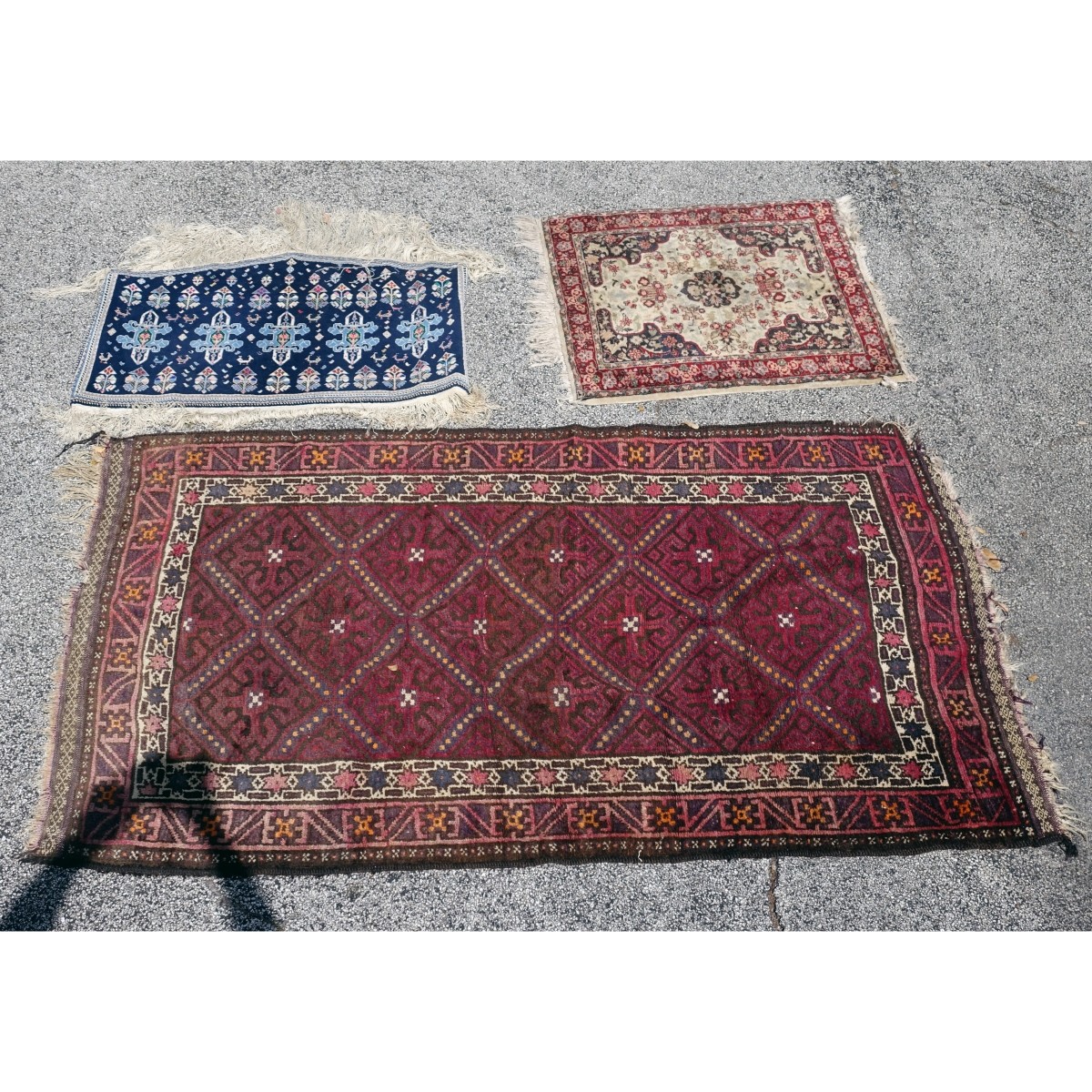 Three Middle Eastern Rugs