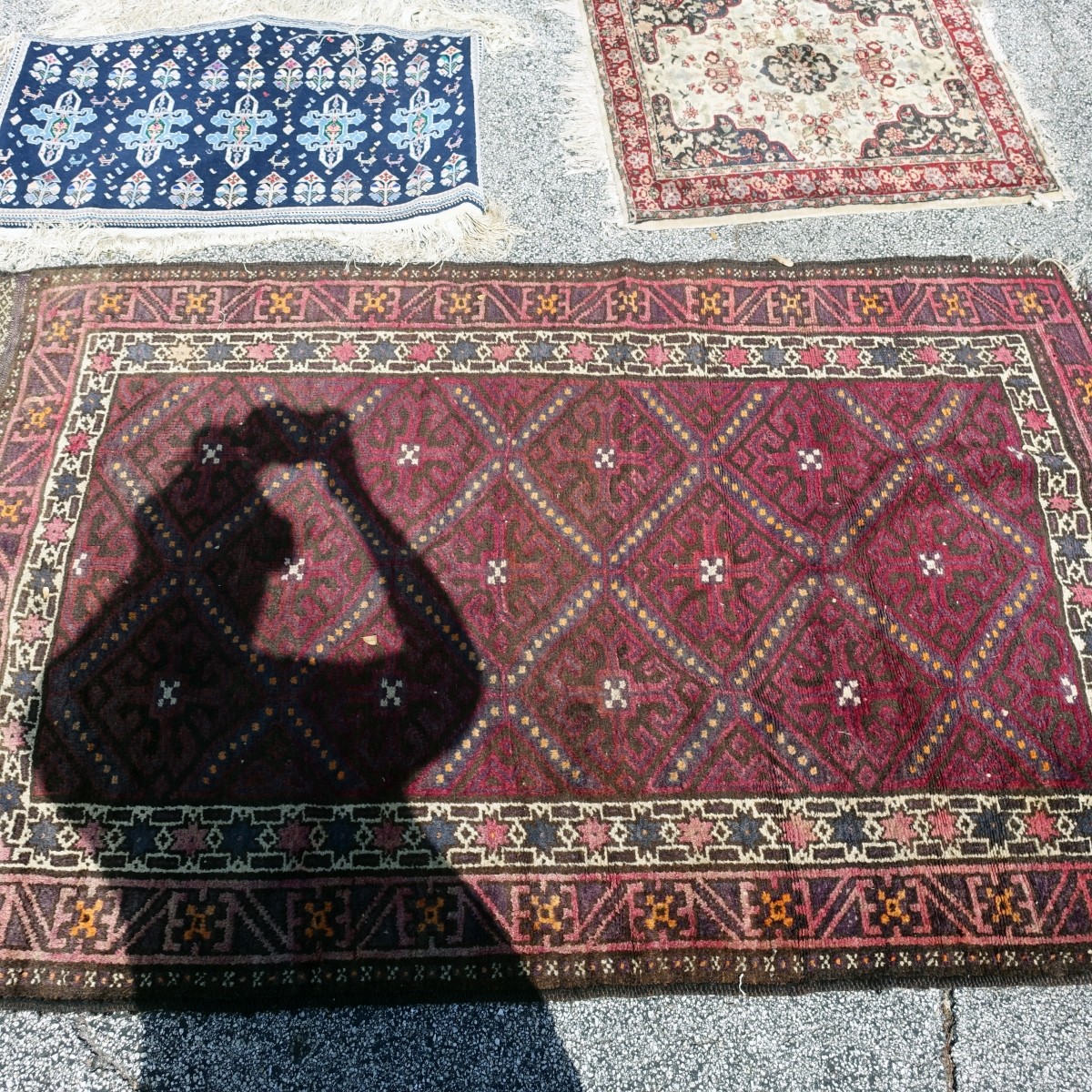 Three Middle Eastern Rugs