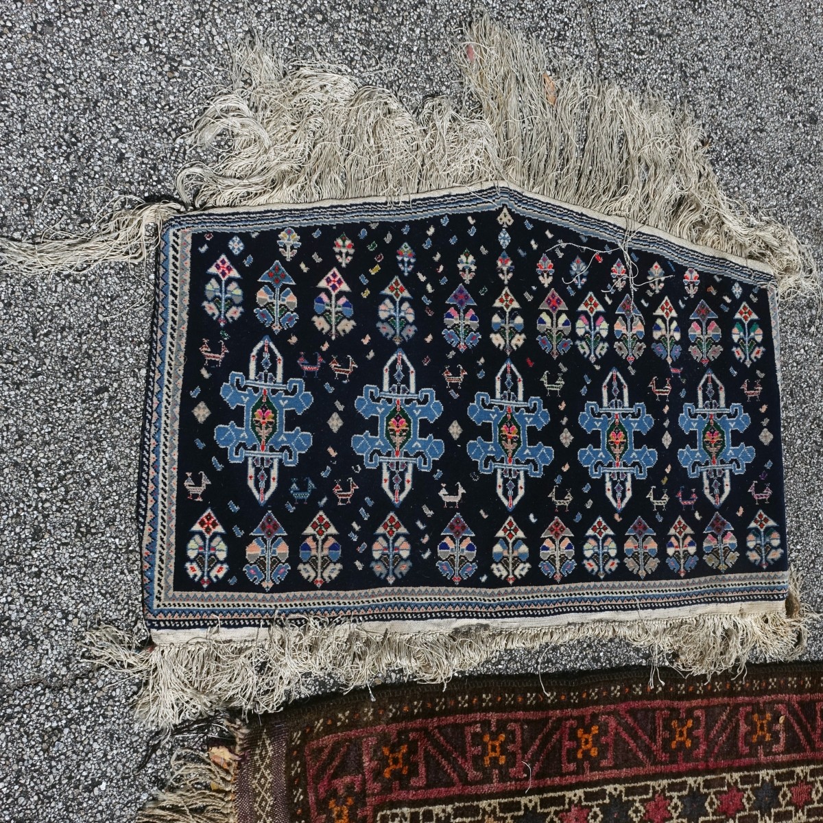 Three Middle Eastern Rugs