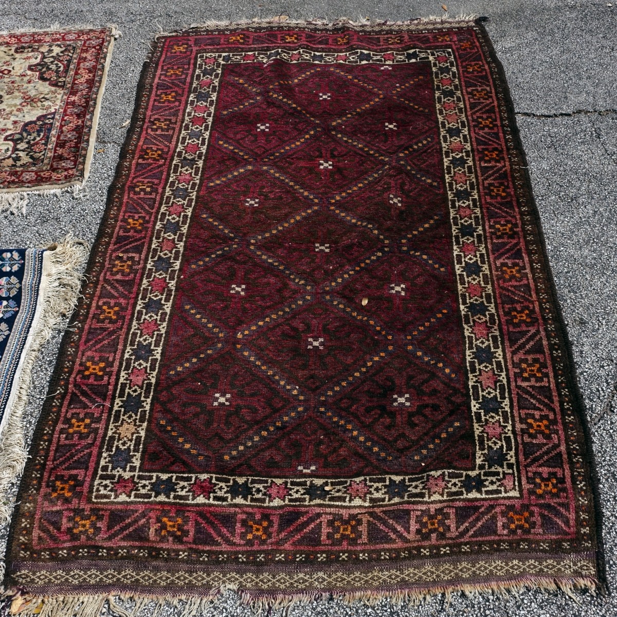 Three Middle Eastern Rugs