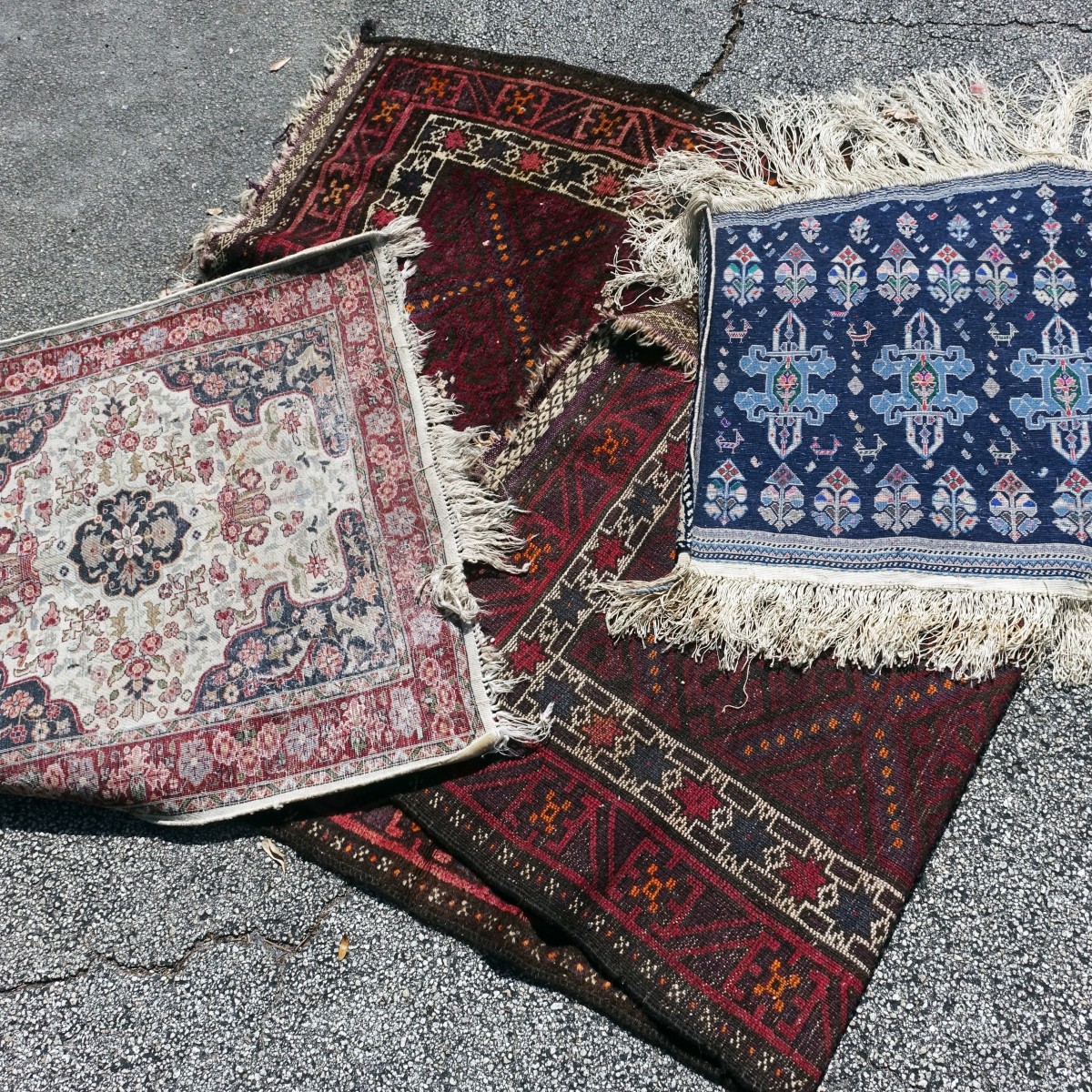 Three Middle Eastern Rugs