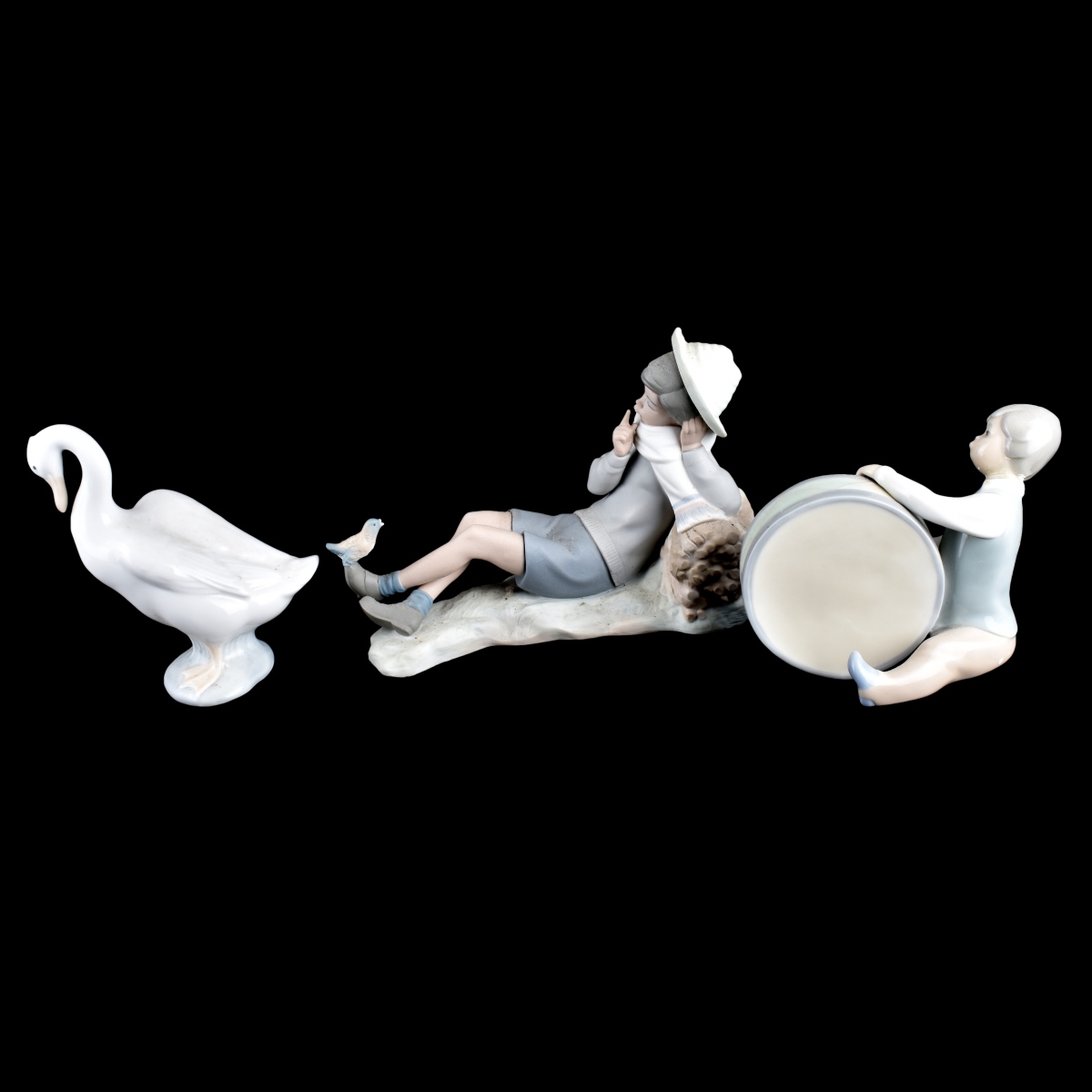 Three (3) Lladro and Nau Porcelain Figurines