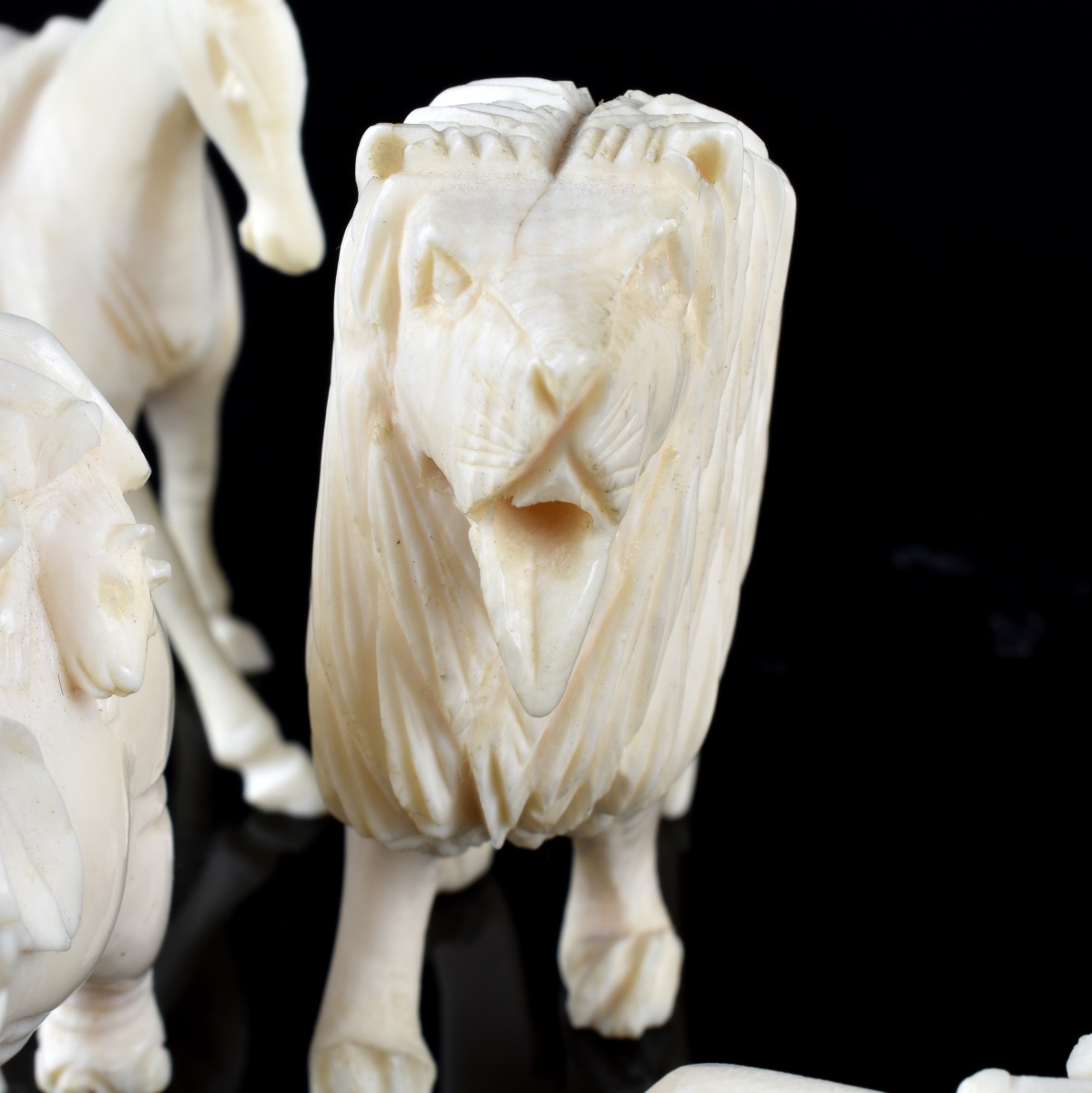 Twelve (12) Antique Oriental Ivory Figurines