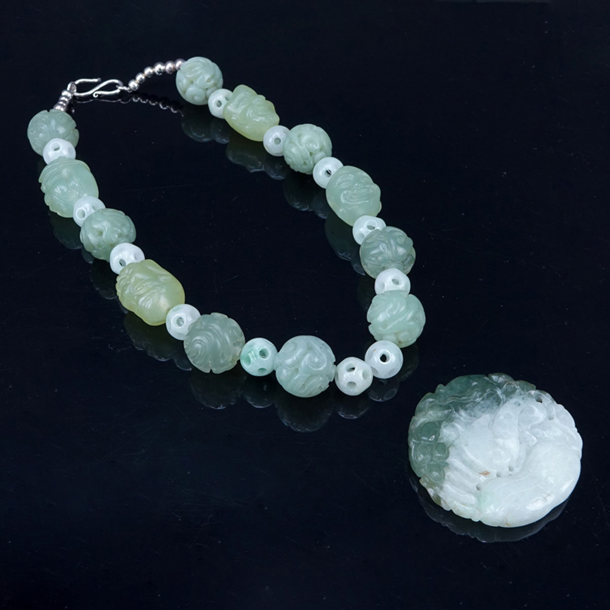 Collection of Two (2) 19/20th Century Chinese Jade Jewelry Items.