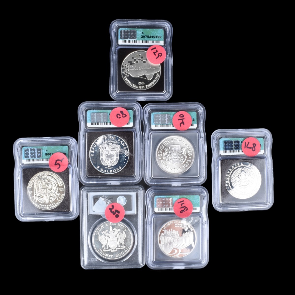 Seven (7) Silver Coins