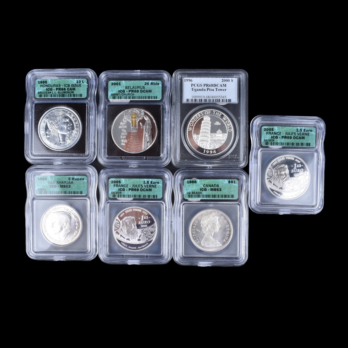 Seven (7) Assorted Large Silver Coins