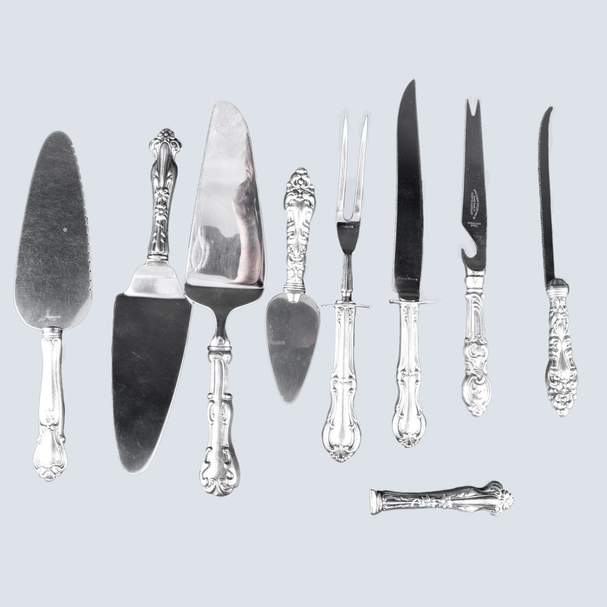 Grouping of Nine (9) Sterling Silver Handled Table