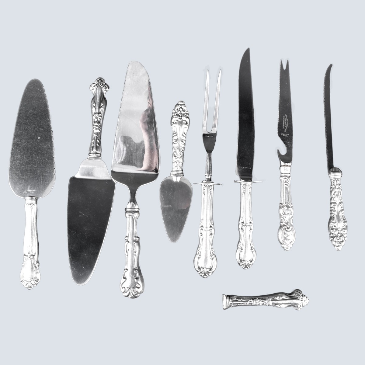 Grouping of Nine (9) Sterling Silver Handled Table