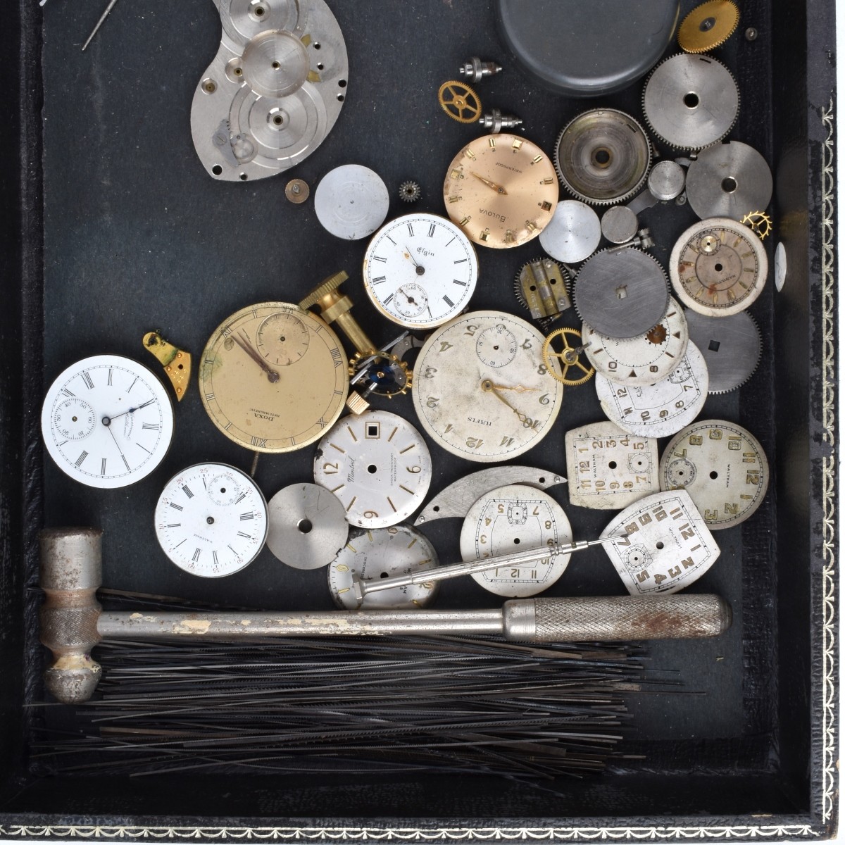 Collection of Watch Parts and Tools