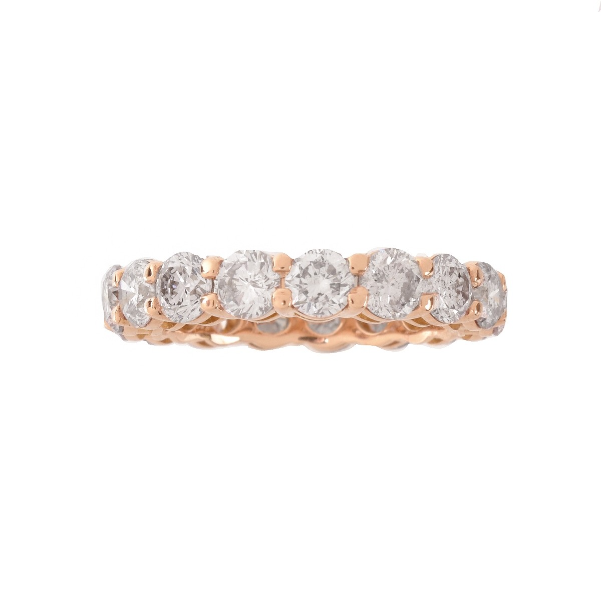 Pink Diamond and 18K Eternity Band