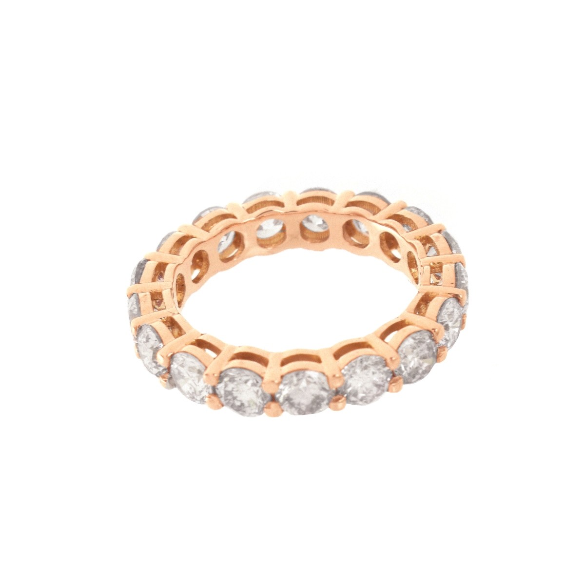 Pink Diamond and 18K Eternity Band