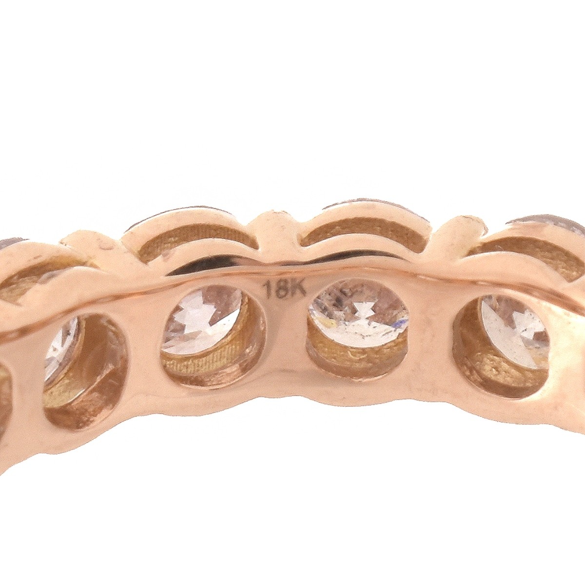 Pink Diamond and 18K Eternity Band