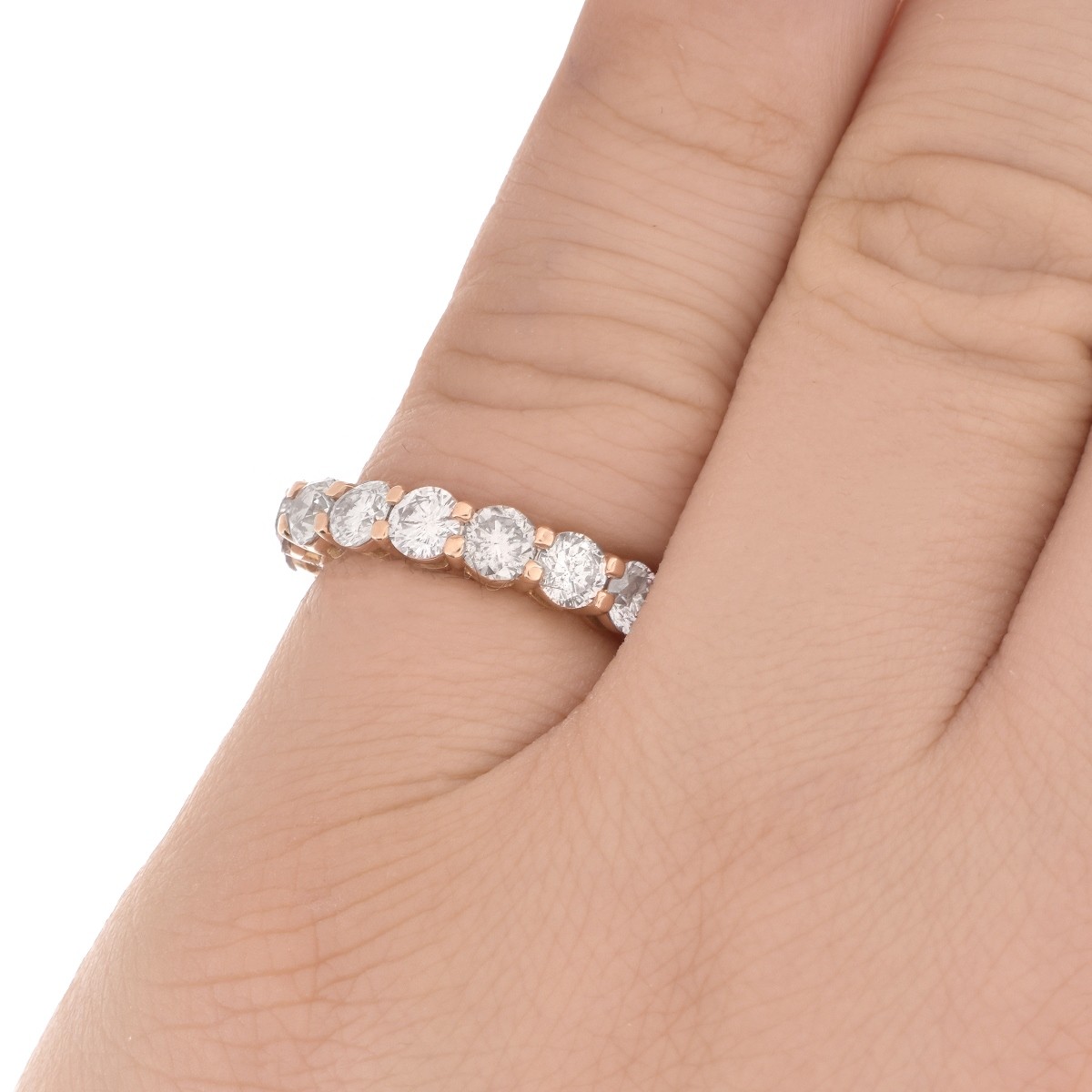 Pink Diamond and 18K Eternity Band