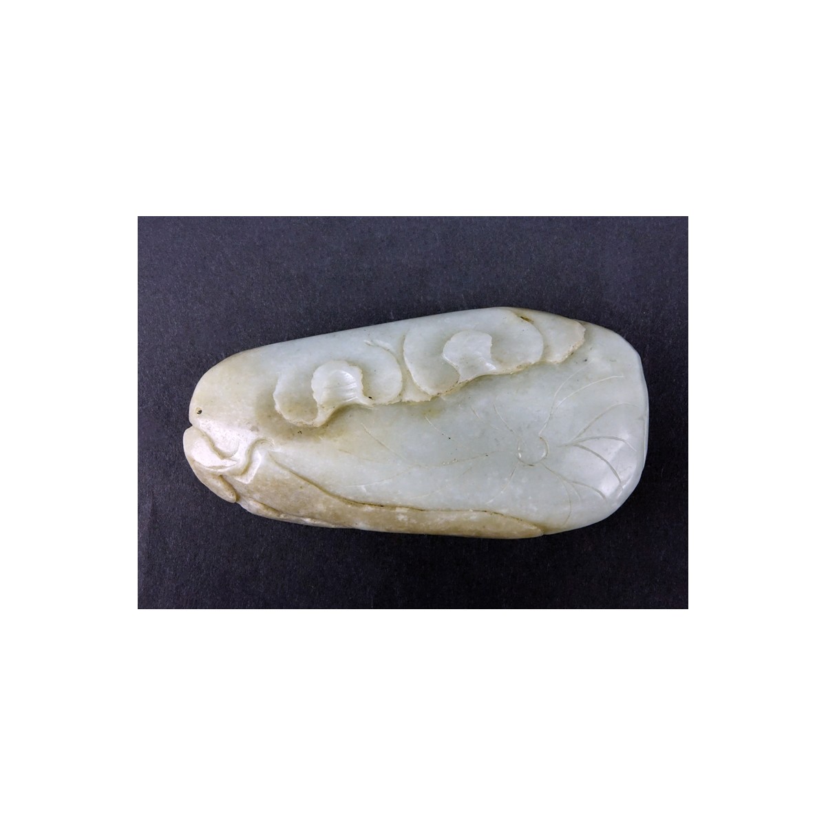 19/20th Century Chinese Carved Jade Pendant. Natural wear. Measures 4" H x 