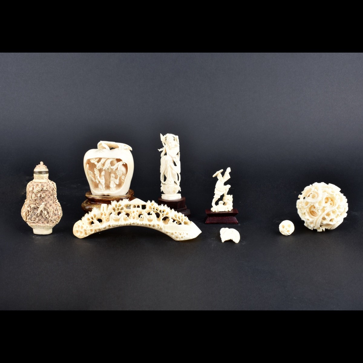 Seven Assorted Carved Ivory Figures