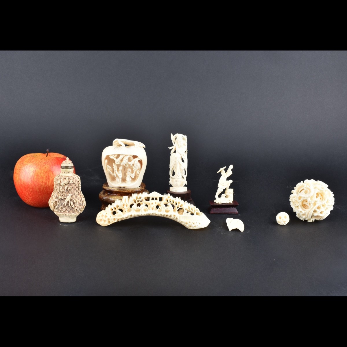 Seven Assorted Carved Ivory Figures
